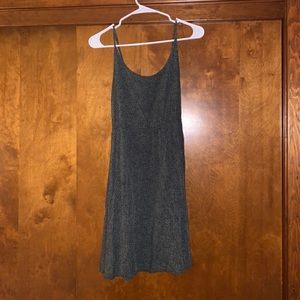 Thin strapped dress with cinched waist.